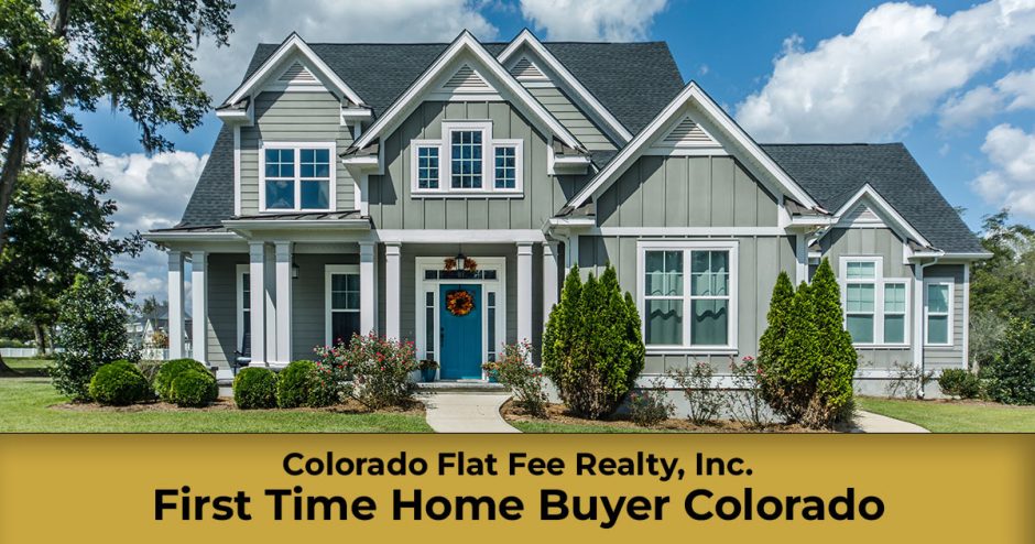 First-time home buyer in Colorado reviewing home-buying costs and paperwork with a real estate agent